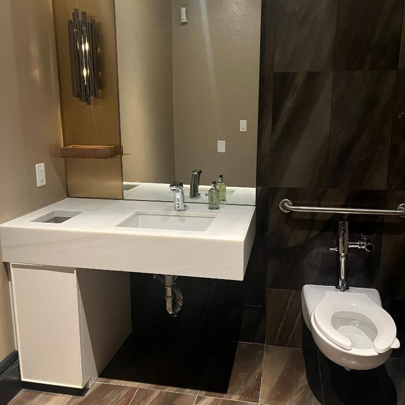 Private guest washroom located at the back of the JW Marriott Executive Lounge in Vancouver.