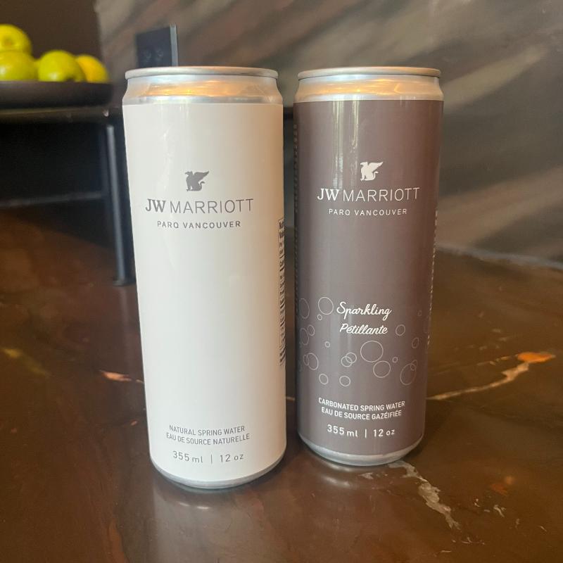 JW Marriott-branded still and sparkling water cans available in the Executive Lounge, Vancouver, BC.