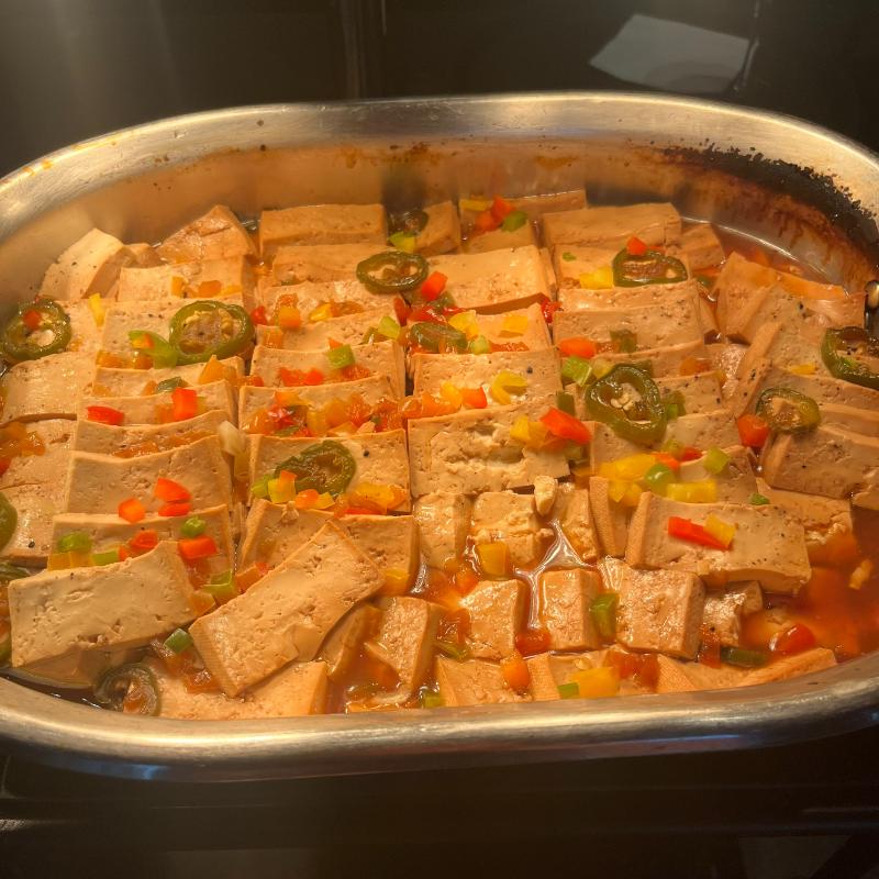 Tofu appetizer topped with pickled jalapeños served at the JW Marriott Executive Lounge.
