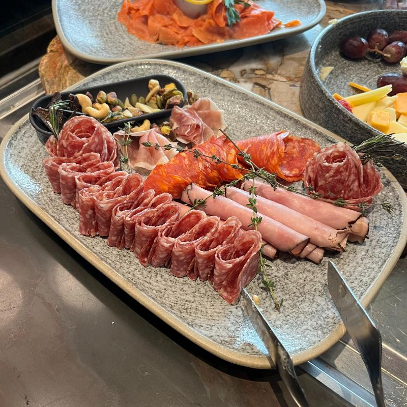Cured meats and lox-style salmon platter from the JW Marriott Executive Lounge breakfast spread.