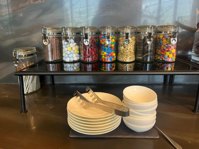 Candy and snack station for guests with a sweet tooth at JW Marriott Lounge, Vancouver.