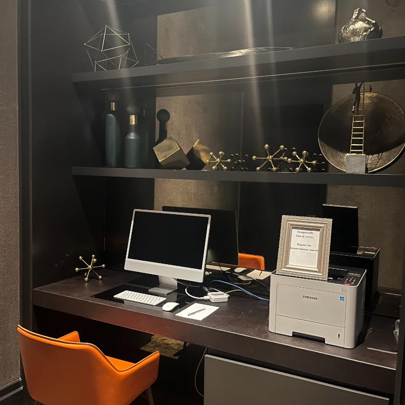 Business workstation with computer and printer at the JW Marriott Executive Lounge, Vancouver.