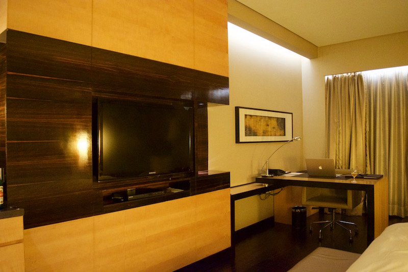 Large Built-In Television And Desk