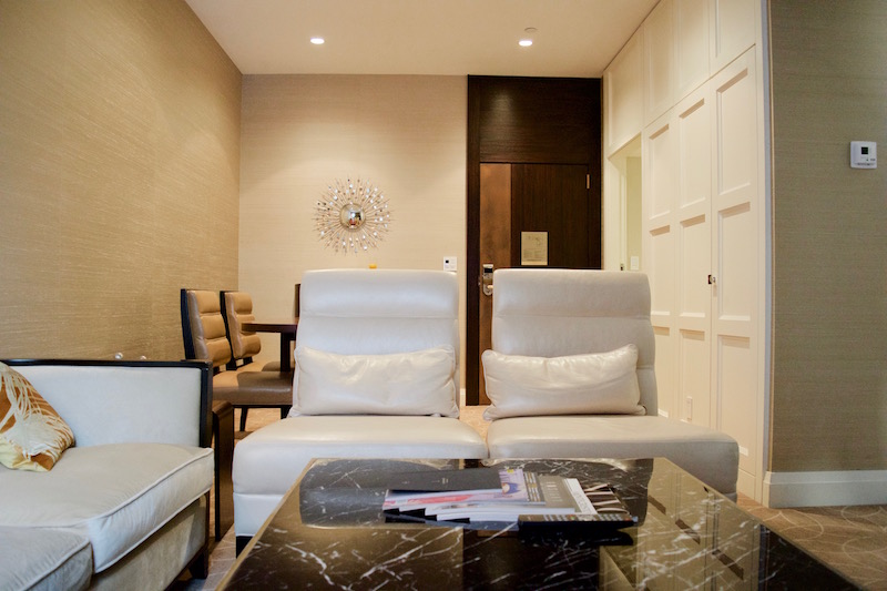Leather Chairs And Marble Coffee Table 