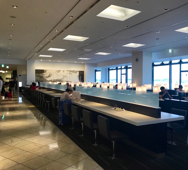 Hightop Seating Between Lounge Area And Buffet